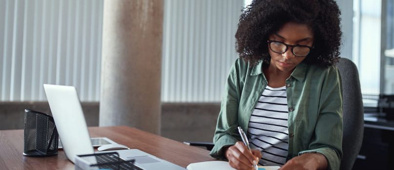 Digital marketer works at desk