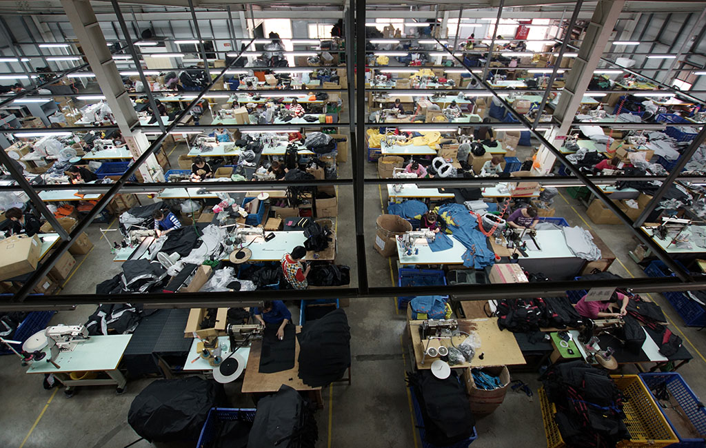 Soft goods production north of Taichung/ Daja, Taiwan, at a factory producing for Xtracycle. Photo by Ross Evans. 