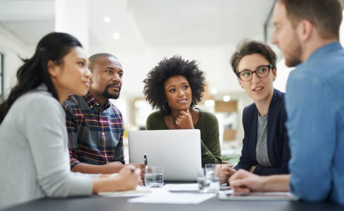 A team of expert web designers in a meeting