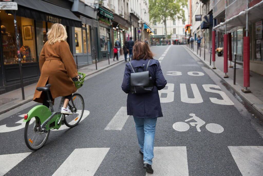 Paris ZTL allows cycling, pedestrians and limits cars.