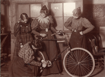 "Women repairing bicycle." Unknown photographer, from "Women Repairing Bicycle, c. 1895" by Unknown - http://arc.lib.montana.edu/msu-photos/item/135. Licensed under CC BY-SA 3.0 via Wikimedia Commons.