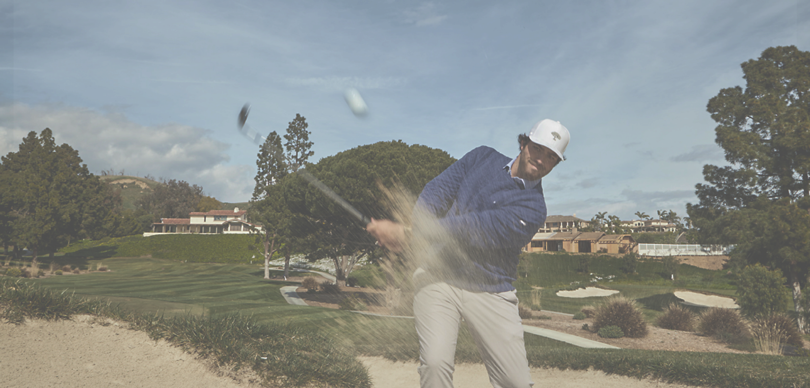 A man playing golf