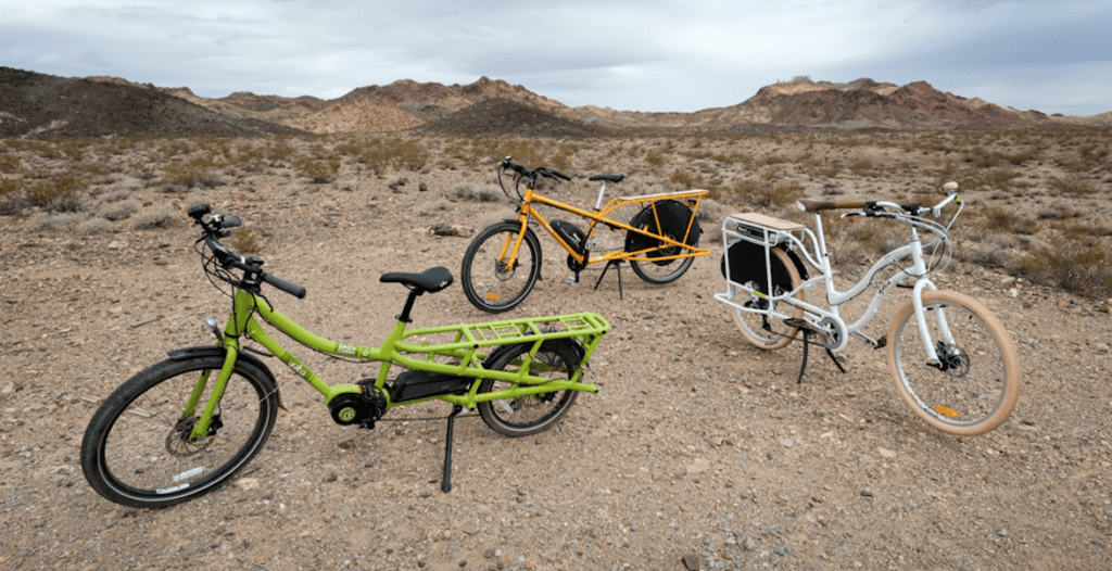 Three electric cargo bikes from Yuba. L-R: The Spicy Curry, the elMundo, and the elBoda Boda V3. Photo by David Niddrie